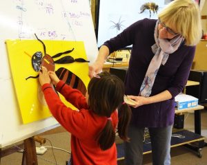 Honey bee on yellow flower